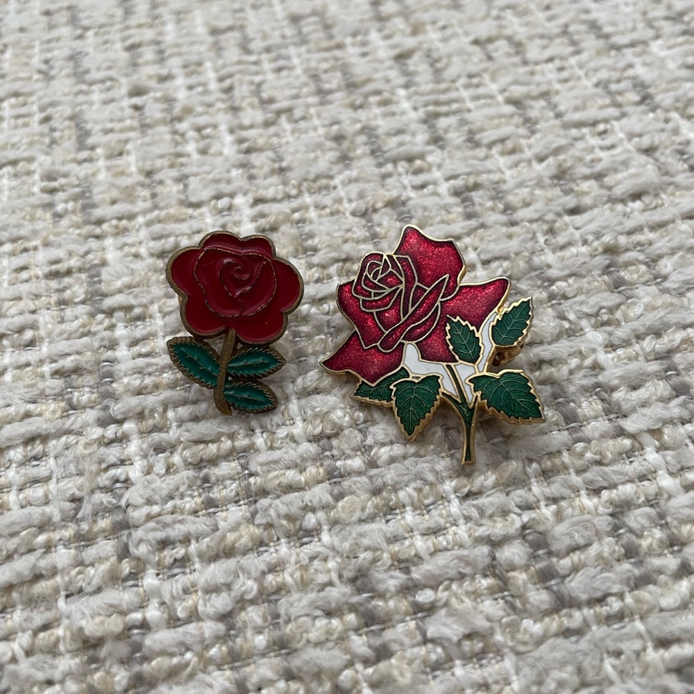 Two rose pins